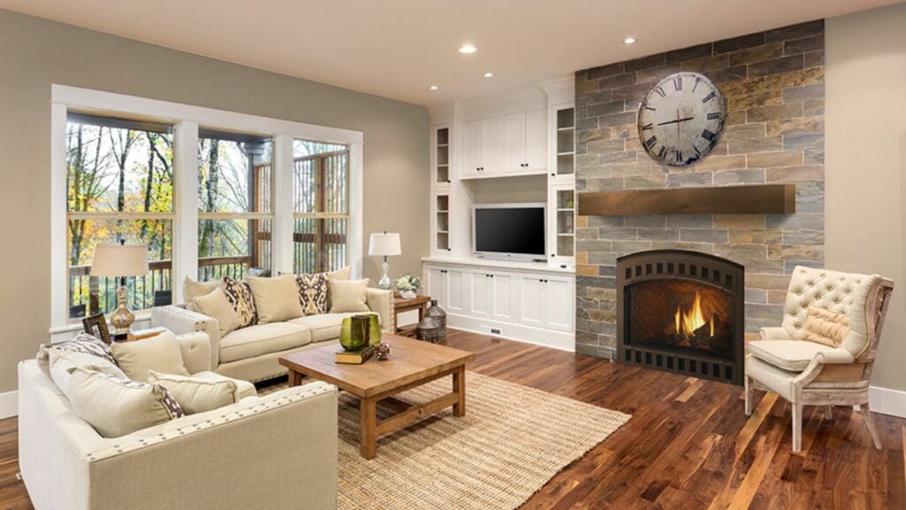 A living room with a lit fireplace